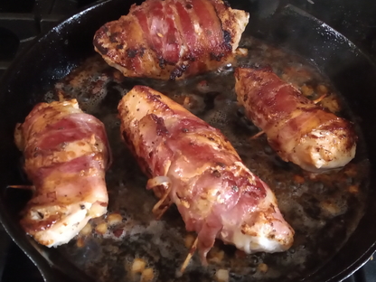Chicken Wrapped In Bacon With Garlic Cooking
